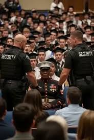Security Approached a Marine at Graduation — What Happened Next Silenced the Entire Gym
