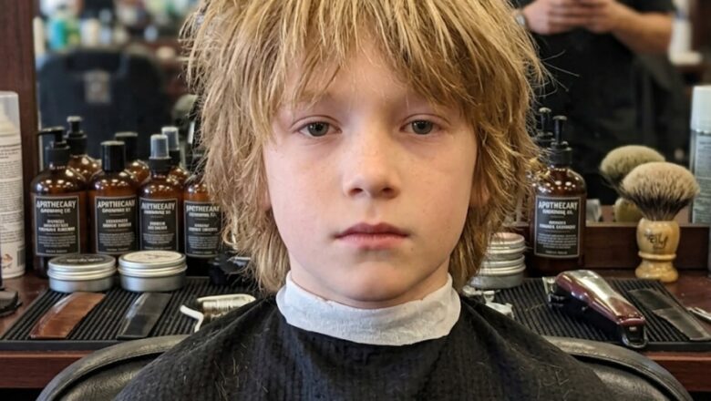 My 9-year-old son went in for a haircut. Then the new barber pulled me aside and whispered, “Check behind his left ear.” Twenty minutes later, two police cars were outside my house.